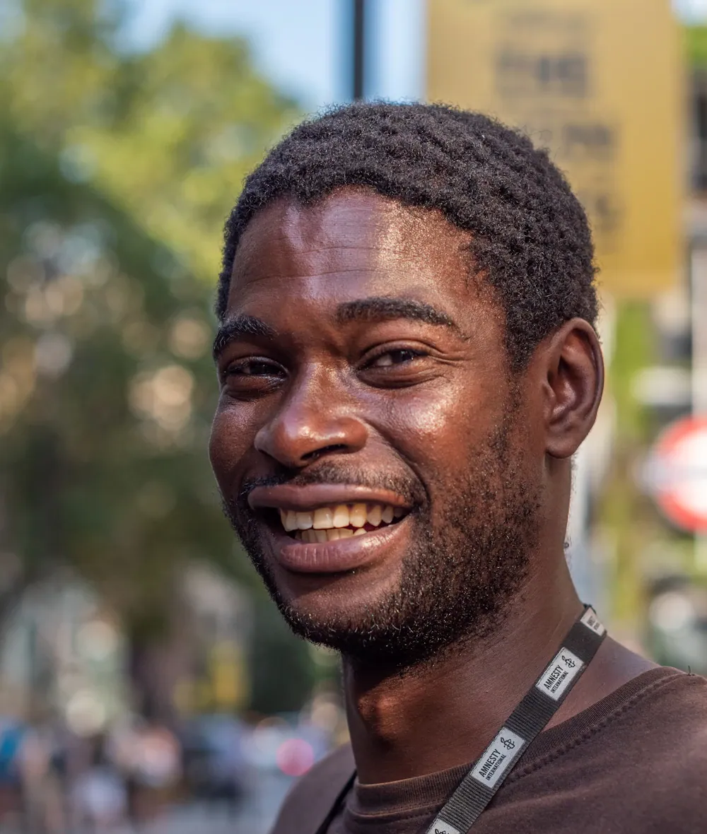 A founder laughing on a London street